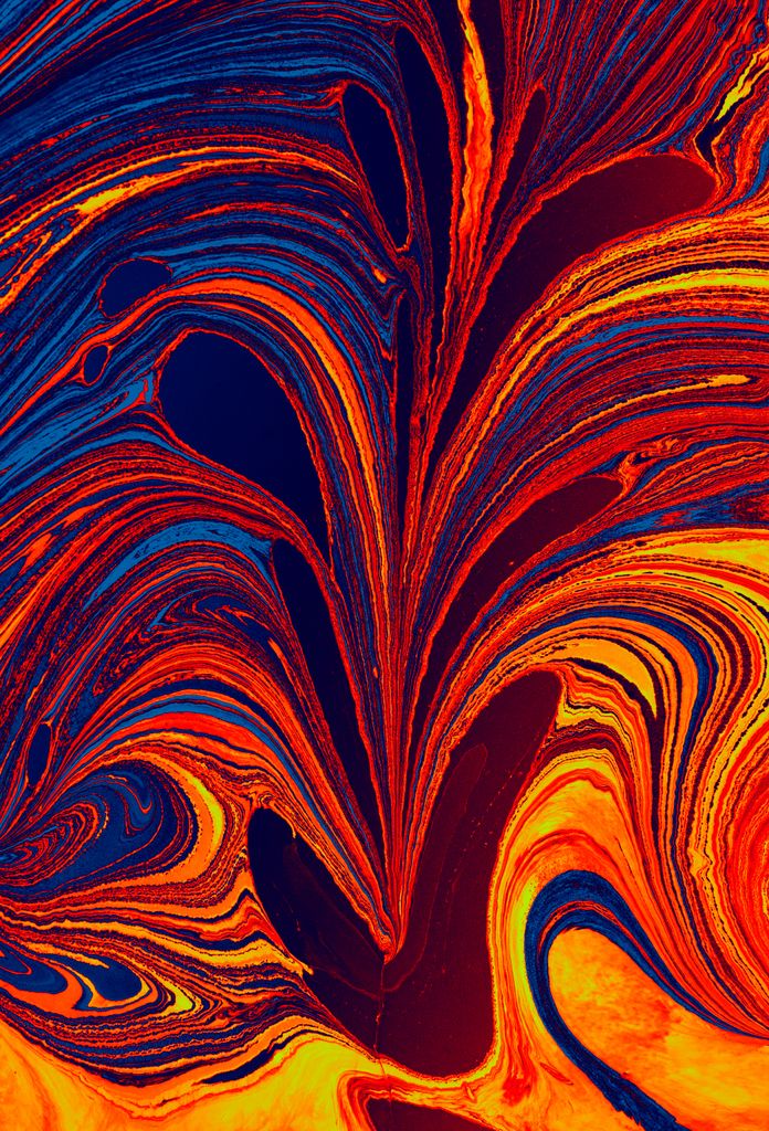 Explore vibrant swirling patterns in this mesmerizing abstract artwork, blending fiery reds and cool blues.